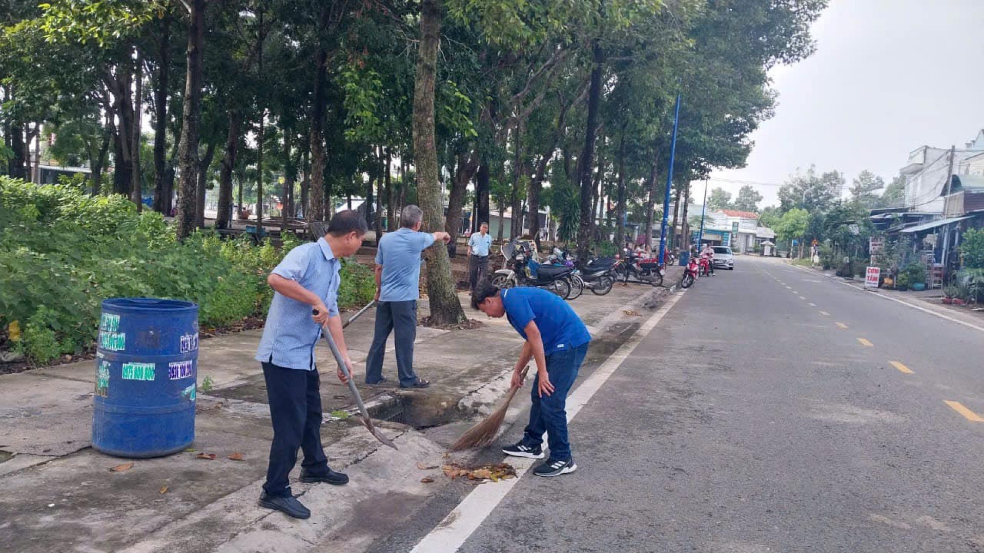 May be an image of 5 people and road