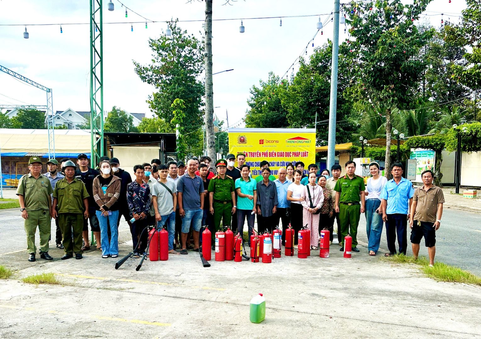 A group of people standing together outsideDescription automatically generated