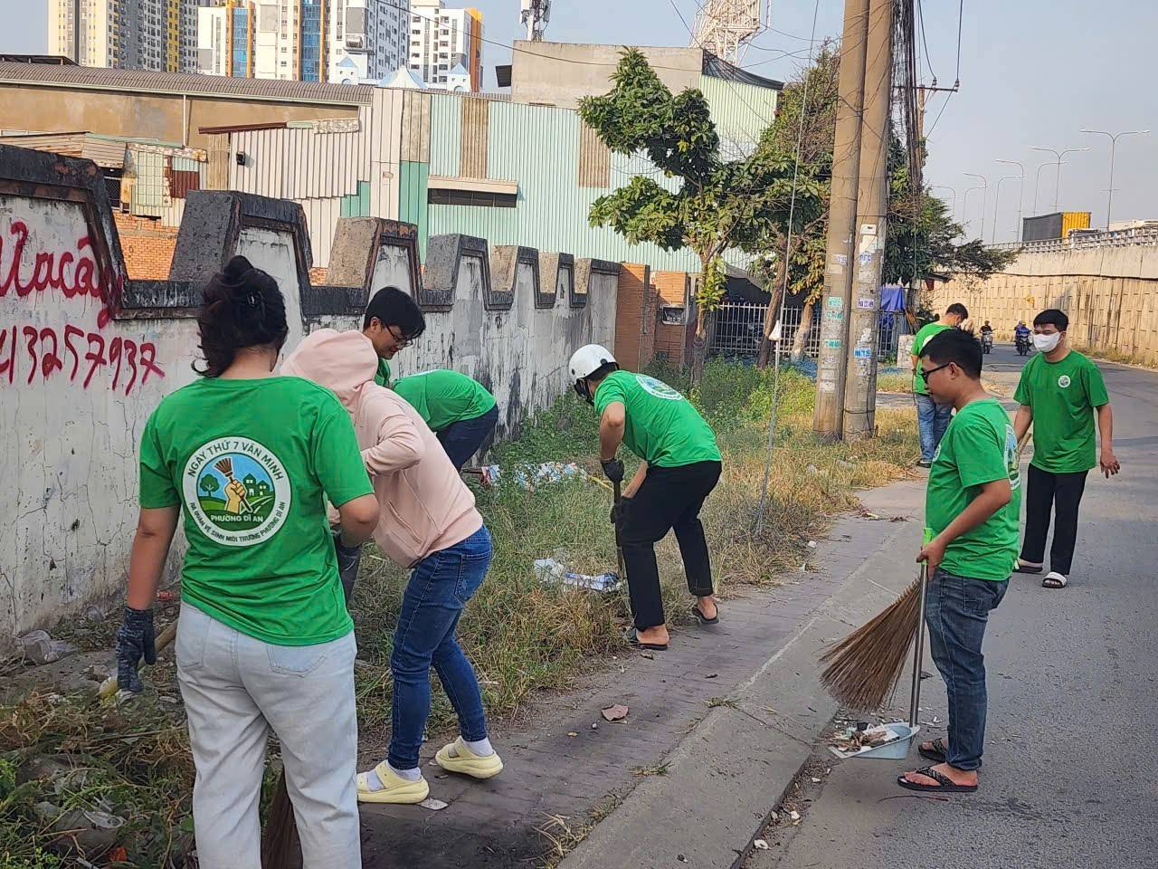 May be an image of one or more people, tree and text