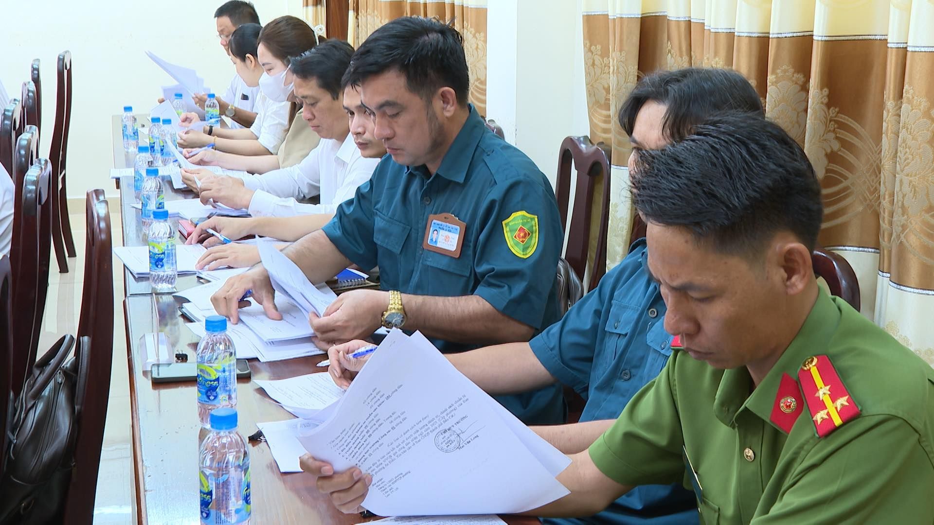 May be an image of 2 people and text