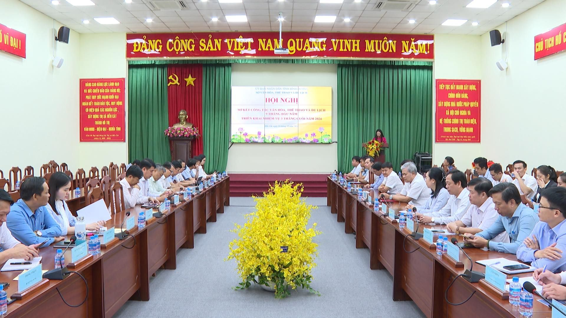 May be an image of 5 people, dais and text