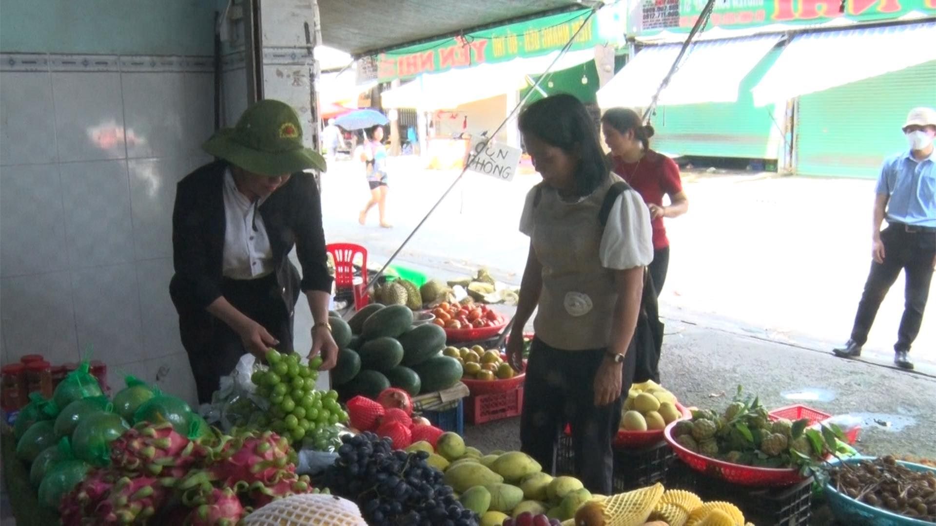 May be an image of 5 people, watermelon and longan