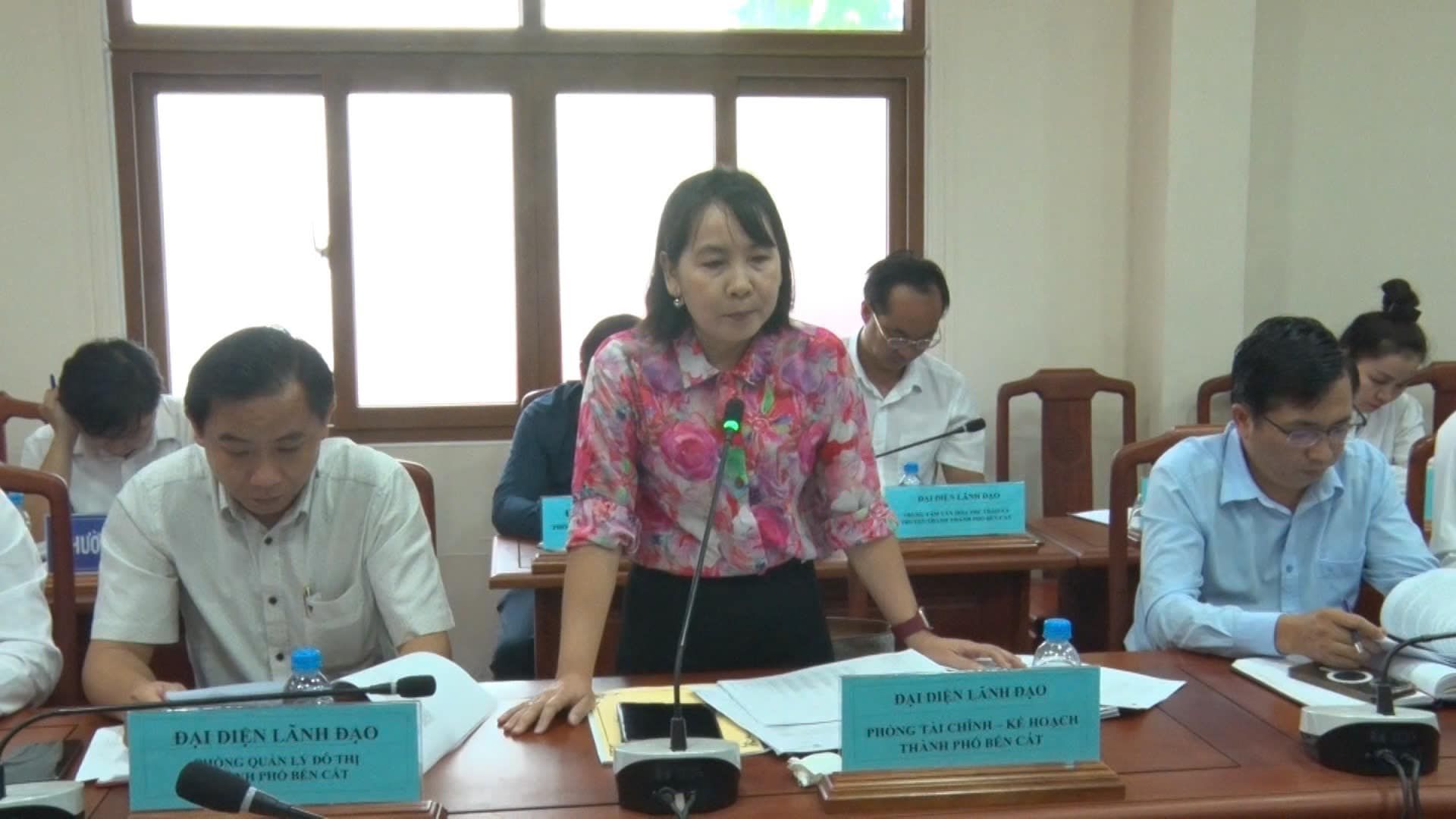 May be an image of 4 people, people studying and text