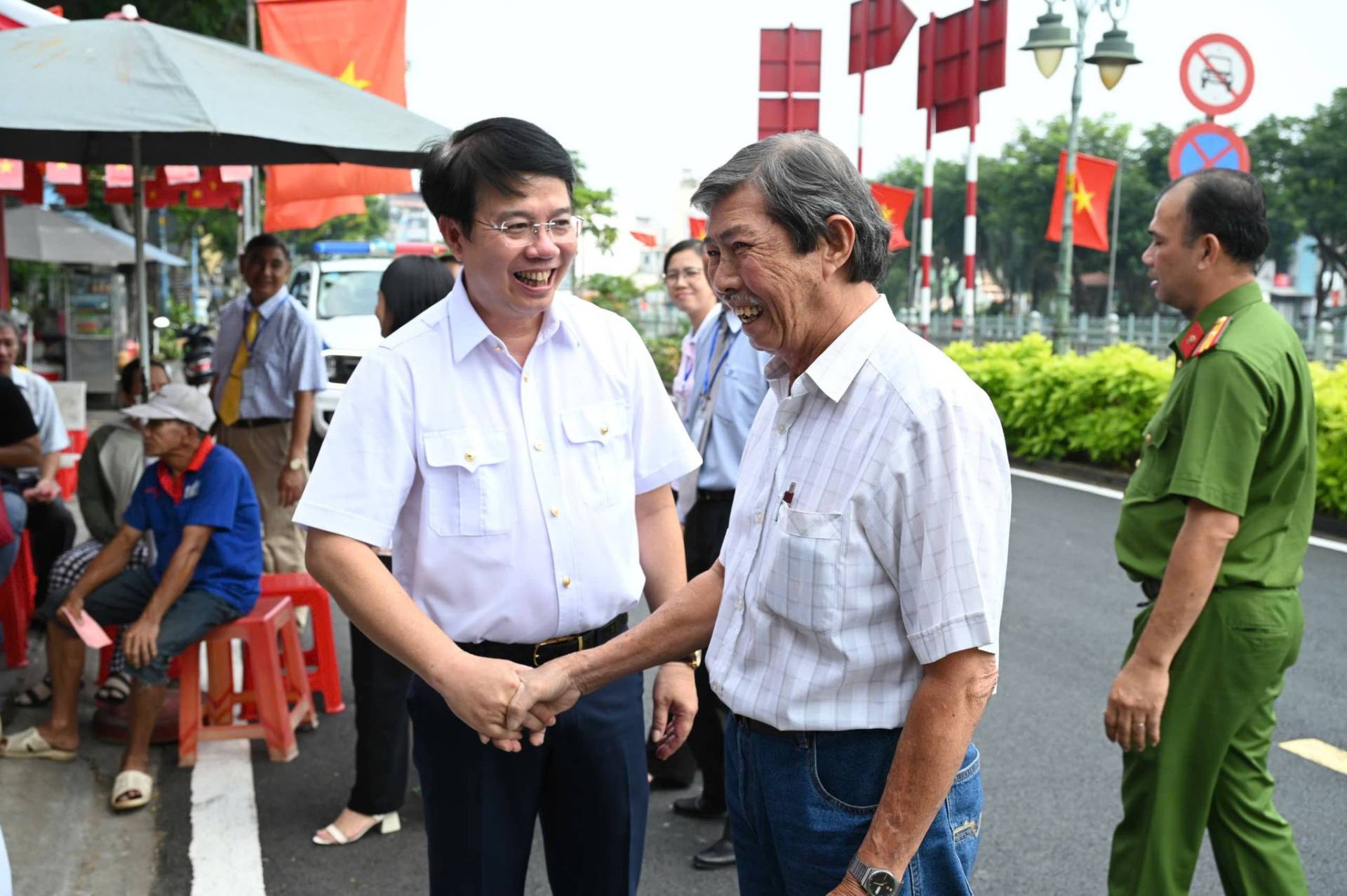 May be an image of one or more people and text